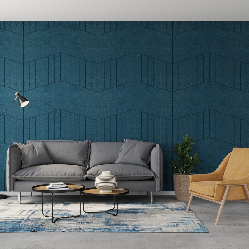 Fracture Track acoustic wall panels in denim blue behind a sofa